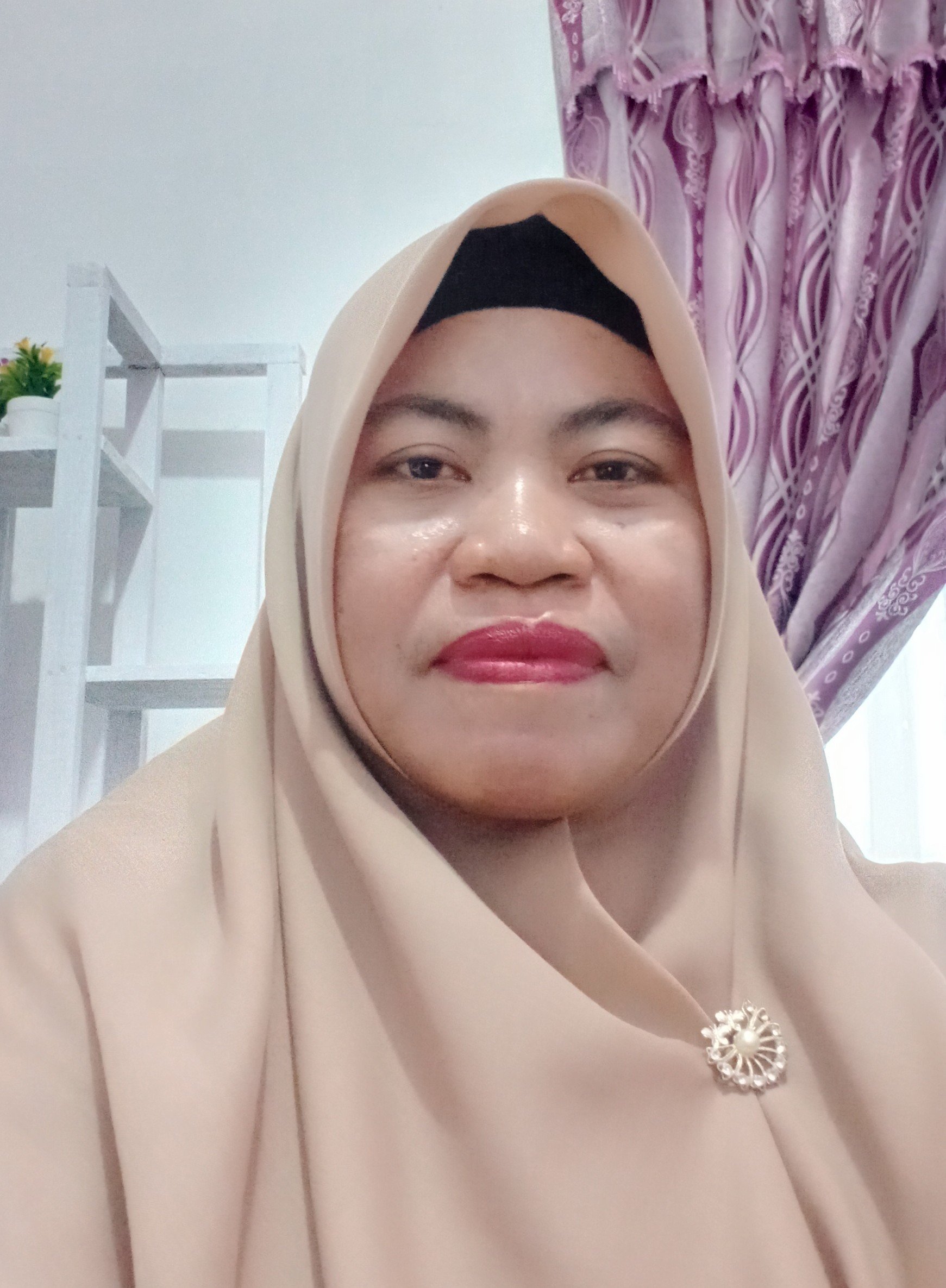 Saina M Nur, S.Pd.,M.M